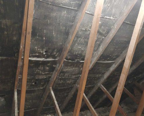 House rafters after polar blast has Professional removed spray foam insulation